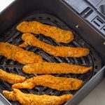 chicken fries cooked on air fryer basket